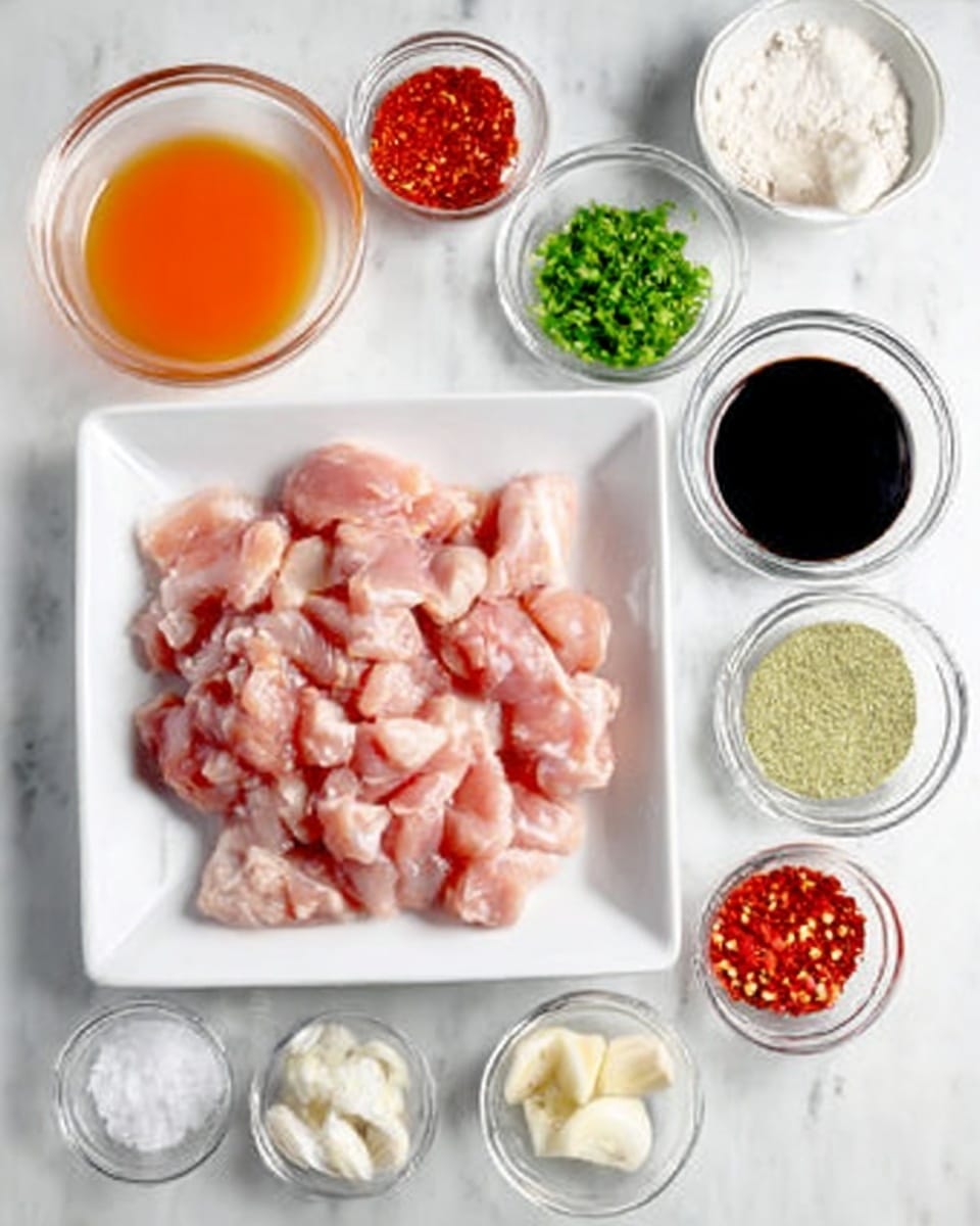 The image shows a white square plate in the center filled with pieces of raw chicken meat. Around the plate, there are small clear glass bowls and containers with different ingredients: an orange liquid, a black paste, a light green mix, white sugar, red sauce, chopped green herbs, and white powder, as well as garlic cloves and red chili flakes in tiny white dishes. Everything is placed on a white marbled surface, giving a clean and fresh look. photo taken with an iphone --ar 4:5 --v 7