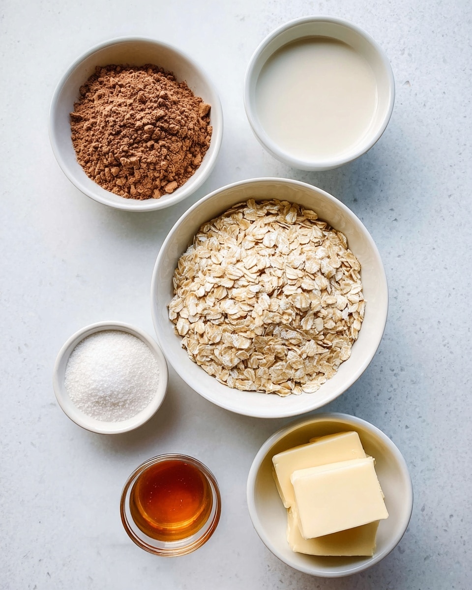 The image shows six white bowls arranged neatly on a white marbled surface, each containing different ingredients. At the center is a bowl filled with light beige rolled oats with a rough texture. Above it, slightly to the left, is a bowl of brown cocoa powder with a dry, powdery look. To the right, a bowl contains a smooth, thick white liquid. Below the oats to the left, a bowl holds fine, white granulated sugar. Near the center right, there is a small glass bowl with a small amount of amber-colored liquid, likely vanilla extract, which is translucent and shiny. At the bottom right, another bowl contains two pieces of pale yellow butter with a smooth, solid texture. The clean, minimal setup emphasizes the natural colors and textures of the ingredients. photo taken with an iphone --ar 4:5 --v 7