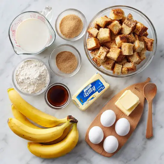A top-down view of ingredients laid out on a white marbled surface. At the top right is a clear glass bowl filled with many pieces of golden-brown cubed bread. To the left of the bowl is a clear measuring cup with white milk inside. Below that is a small glass bowl with light brown sugar and another small glass bowl with a mix of cinnamon and salt. In the middle center are four bright yellow bananas with some dark spots. Below the bananas is a stick of butter with blue and white packaging. To the right of the butter is a small wooden board holding six white eggs. Below the eggs is a small glass bowl filled with white flour, and to the left of the bowl is a small wooden spoon holding dark brown vanilla extract. Photo taken with an iphone --ar 4:5 --v 7