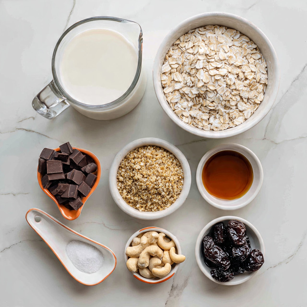 The image shows eight white dishes and a glass measuring cup arranged on a white marbled surface. In the glass measuring cup, there is white milk filling most of it. A large white bowl is filled with light beige rolled oats with a slightly rough texture. Next to it, a small spoon-shaped dish holds white granulated salt. A round white bowl contains a heap of golden-brown ground flaxseeds with a coarse texture. Below, three small white spoon-shaped dishes with orange rims hold different ingredients: one has dark brown chocolate chips, another has pale beige cashew nuts, and the third is filled with a dark amber liquid, likely maple syrup. A small white round dish holds shiny, wrinkled black prunes. The arrangement creates a neat, clean, and organized look. photo taken with an iphone --ar 4:5 --v 7