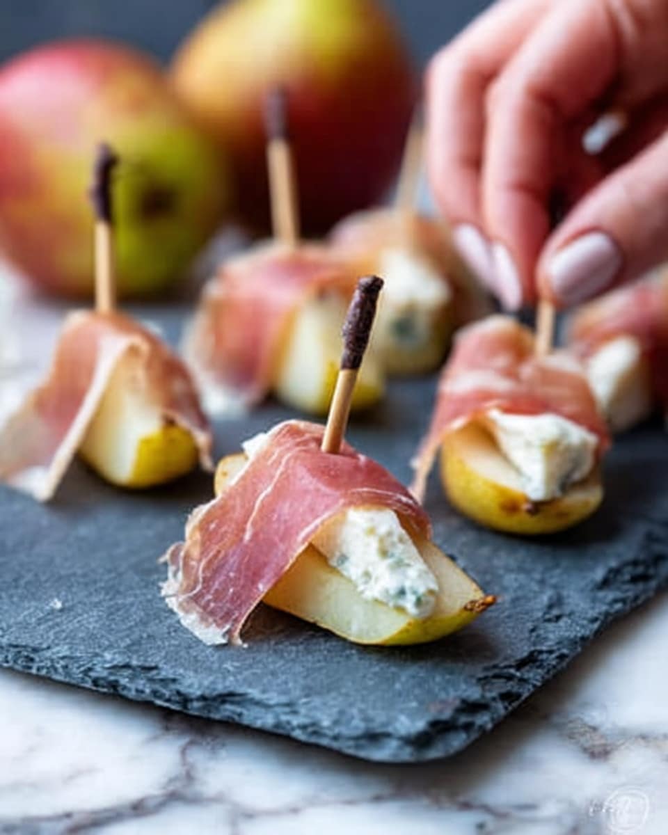 The image shows five small appetizers arranged in a row on a long white rectangular plate, placed on a white marbled surface. Each appetizer has a base of golden brown potato wedges topped with green leafy herbs. Over the herbs, there is a slice of pink prosciutto wrapped around a white creamy cheese. The appetizers are drizzled with a light brown sauce that adds shine and texture. The colors contrast well: bright green, warm brown, soft pink, and white. photo taken with an iphone --ar 4:5 --v 7