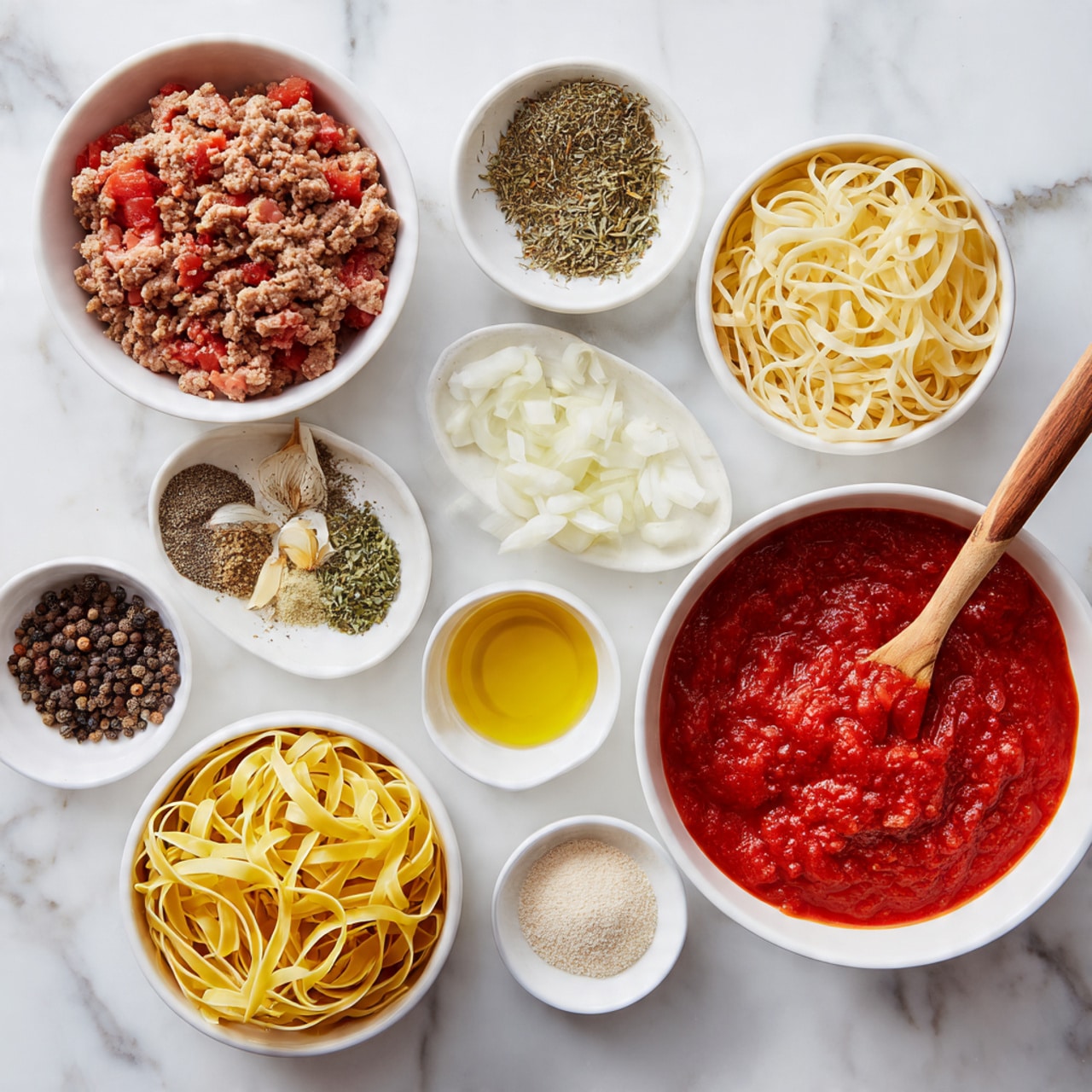 The image shows several small white bowls arranged on a white marbled surface, each holding a different ingredient. There is one bowl with ground meat, one with chopped onions, one with dried herbs, one with diced garlic cloves, one with small peppercorns, one with olive oil, and one with a light powder, likely a spice. A larger white bowl contains yellow tubular pasta, and another larger white bowl holds a rich red tomato sauce with a wooden spoon resting inside. The colors range from deep red, pale yellow, white, and earthy tones, all neatly arranged for cooking. photo taken with an iphone --ar 4:5 --v 7